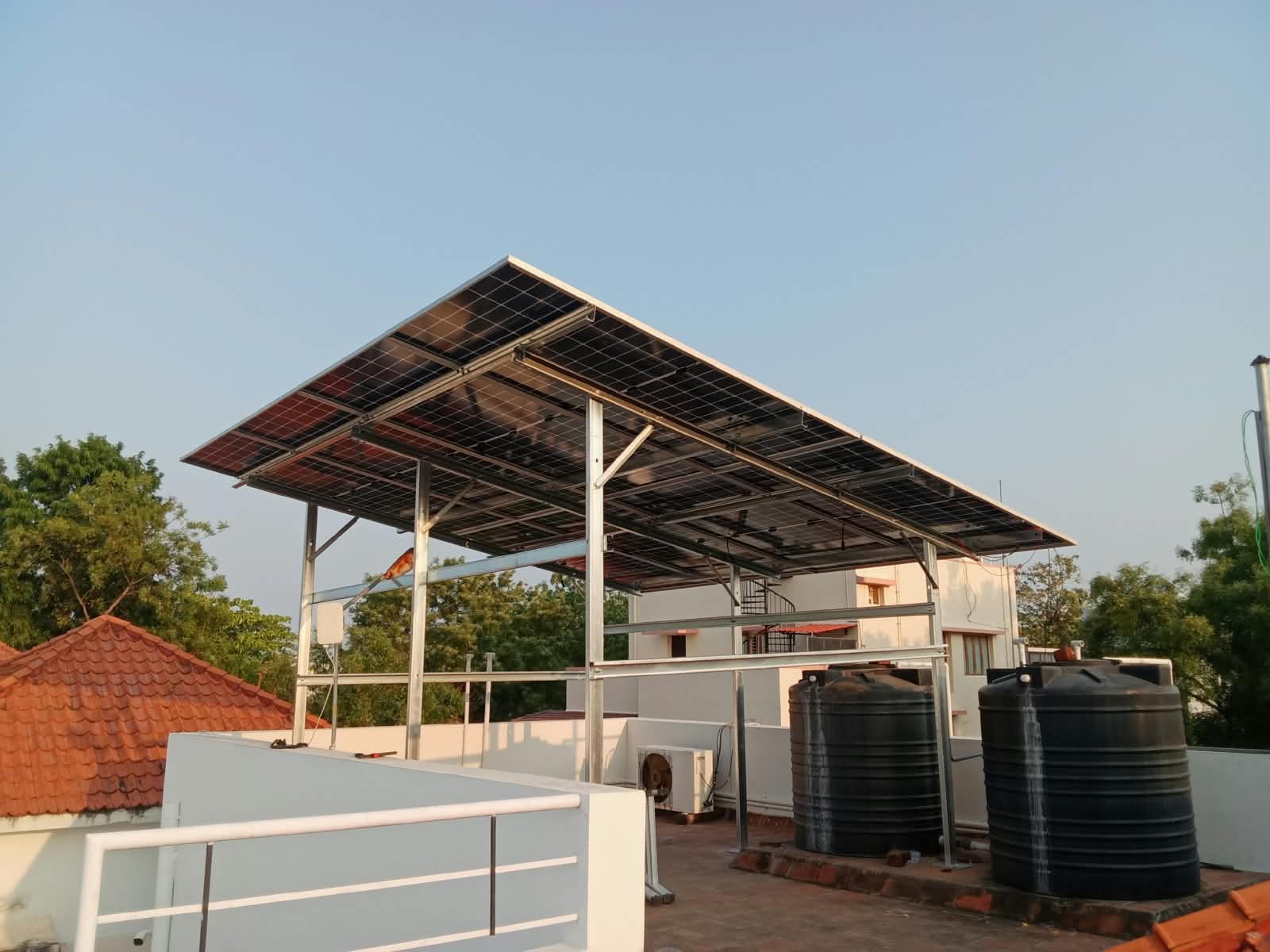 Elevated solar panel structure on a rooftop
